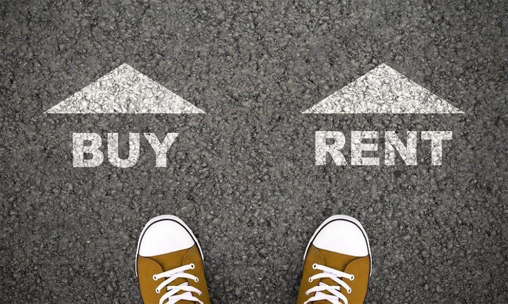 A person's feet on pavement between arrows labeled Buy and Rent