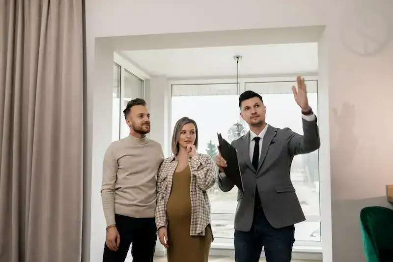 property manager discussing rental with clients in california