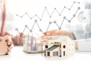 asset manager looking over growth stats of property portfolio