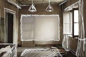 An empty room with a sketched outline overlay, illustrating renovation